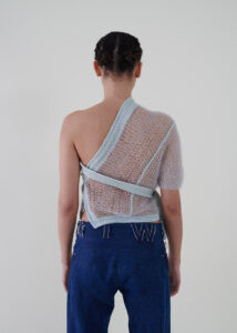 Sustainable fashion with upcycled angora crochet asymmetrical top from Aldwin Teva William