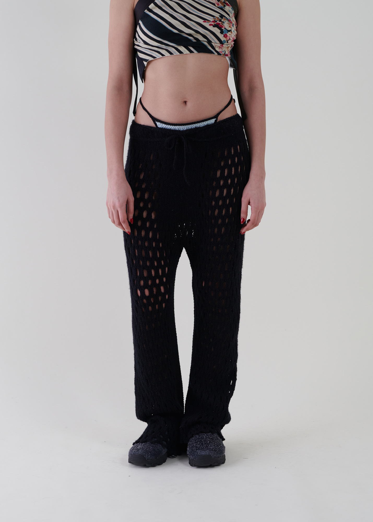 Sustainable fashion with upcycled alpaca crochet trousers from Aldwin Teva William