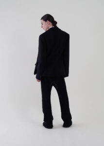 Sustainable fashion with upcycled woolen crepe tailored jacket from Aldwin Teva William