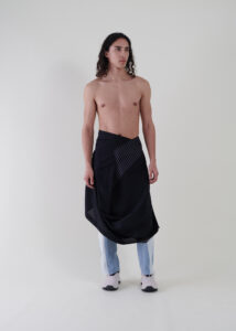 Sustainable fashion with upcycled suiting wool skirt from Aldwin Teva William
