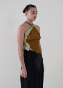 Sustainable fashion with upcycled ties and pleated jersey top from Aldwin Teva William