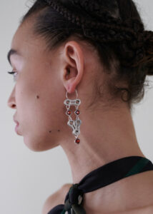 Sustainable fashion and jewlery with zirconias and upcycled roller chain from Aldwin Teva William
